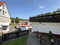 11 Dachterrasse und Garagen